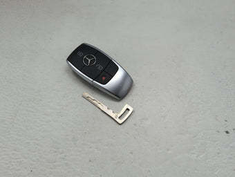 compare product Mercedes-Benz Keyless Entry Remote Fob NBGDM3 A1779052108 Q01 3 buttons