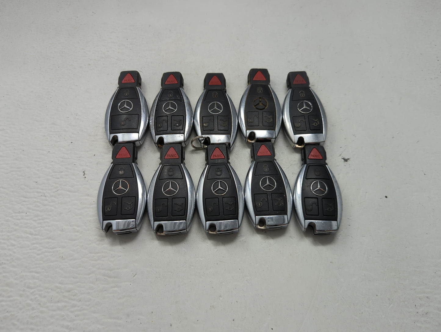Lot of 10 Mercedes-Benz Keyless Entry Remote Fob MIXED FCC IDS 1473957 - Oemusedautoparts1.com
