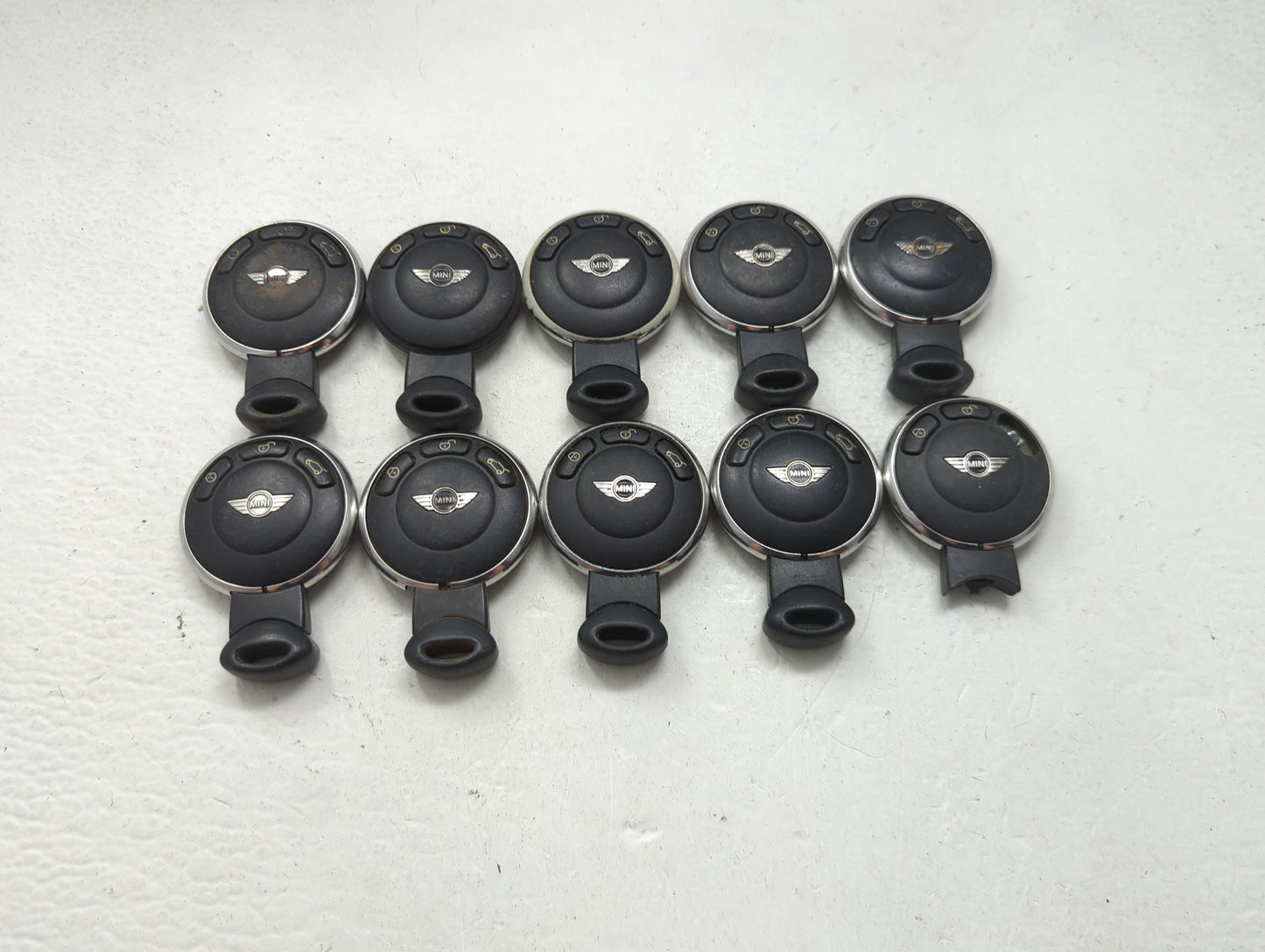 Lot of 10 Mini Keyless Entry Remote Fob MIXED FCC IDS MIXED PART NUMBERS 1474007 - Oemusedautoparts1.com