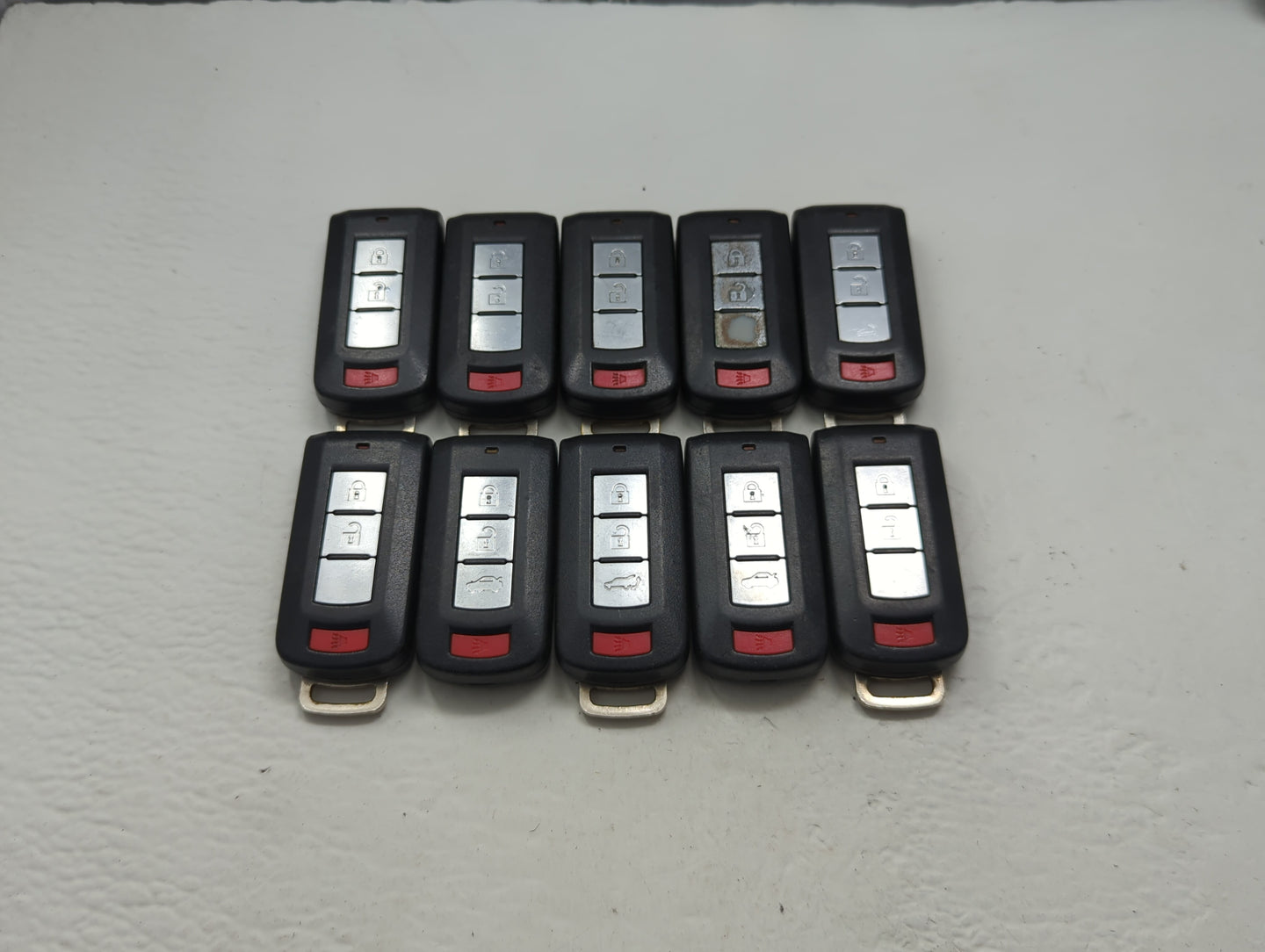 Lot of 10 Mitsubishi Keyless Entry Remote Fob MIXED FCC IDS MIXED PART - Oemusedautoparts1.com