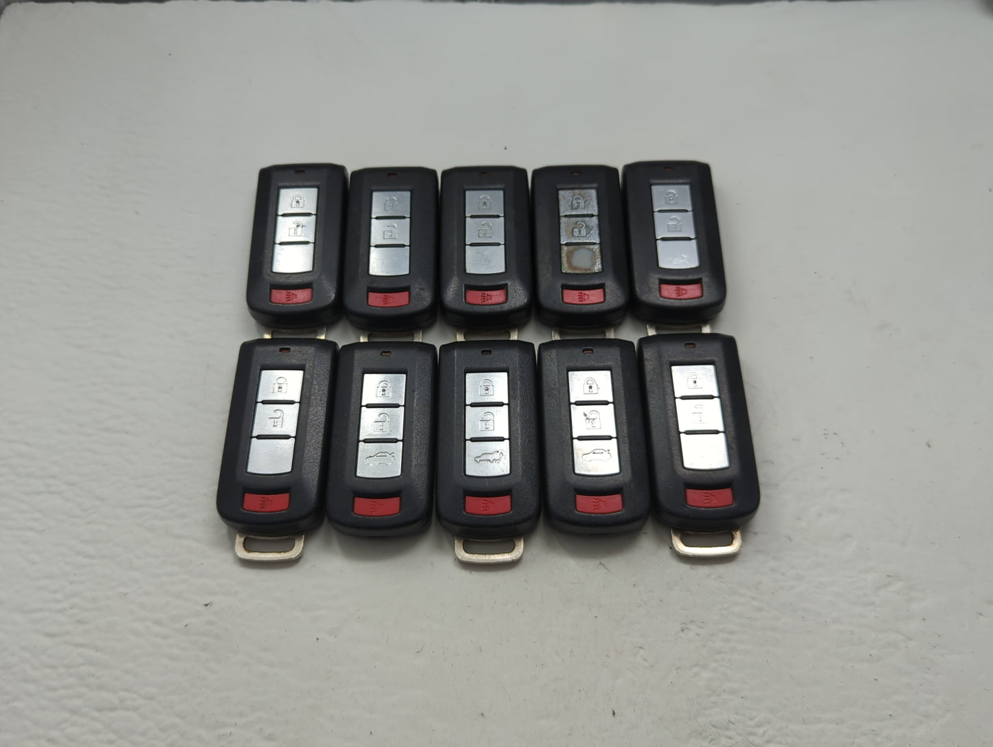 Lot of 10 Mitsubishi Keyless Entry Remote Fob MIXED FCC IDS MIXED PART - Oemusedautoparts1.com