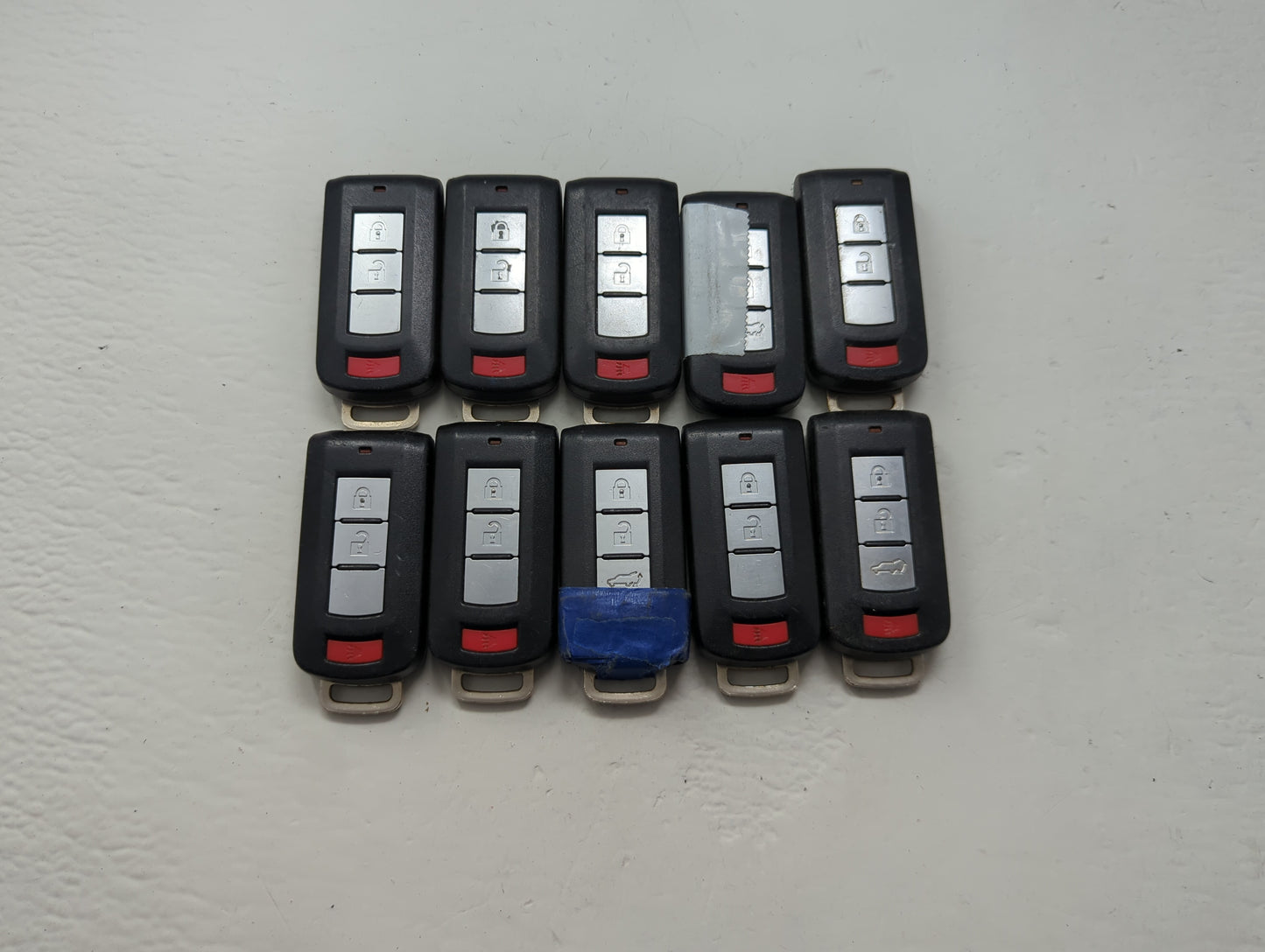 Lot of 10 Mitsubishi Keyless Entry Remote Fob MIXED FCC IDS MIXED PART - Oemusedautoparts1.com