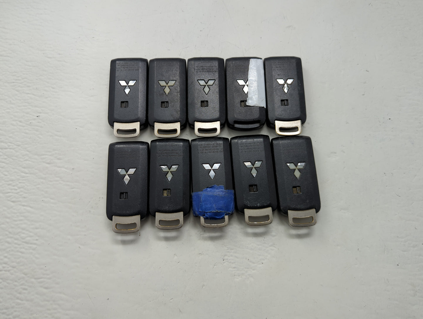 Lot of 10 Mitsubishi Keyless Entry Remote Fob MIXED FCC IDS MIXED PART - Oemusedautoparts1.com