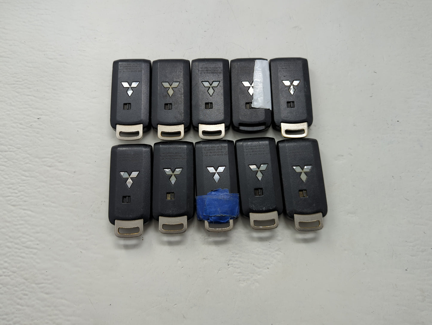 Lot of 10 Mitsubishi Keyless Entry Remote Fob MIXED FCC IDS MIXED PART - Oemusedautoparts1.com