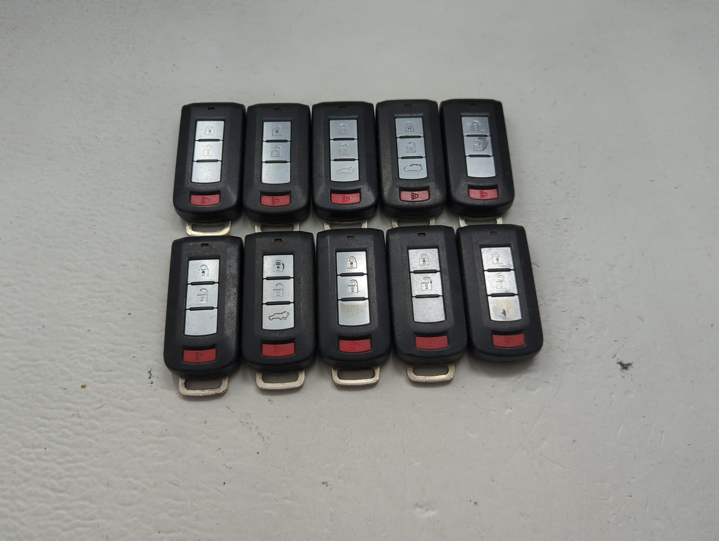 Lot of 10 Mitsubishi Keyless Entry Remote Fob MIXED FCC IDS MIXED PART 1474201 - Oemusedautoparts1.com