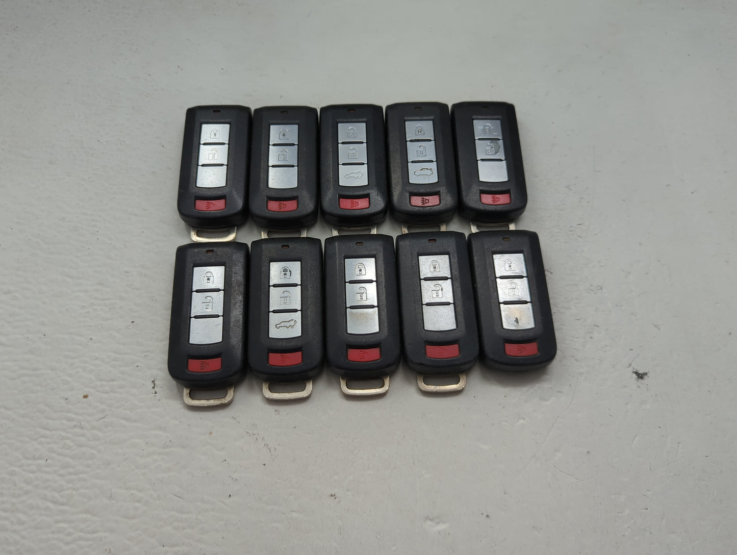 Lot of 10 Mitsubishi Keyless Entry Remote Fob MIXED FCC IDS MIXED PART 1474201 - Oemusedautoparts1.com