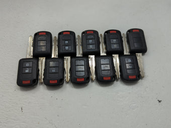compare product Lot of 10 Mitsubishi Keyless Entry Remote Fob MIXED FCC IDS 1474202