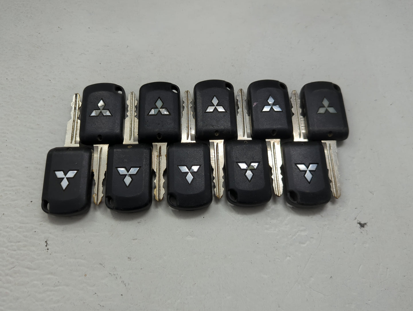 Lot of 10 Mitsubishi Keyless Entry Remote Fob MIXED FCC IDS 1474203 - Oemusedautoparts1.com