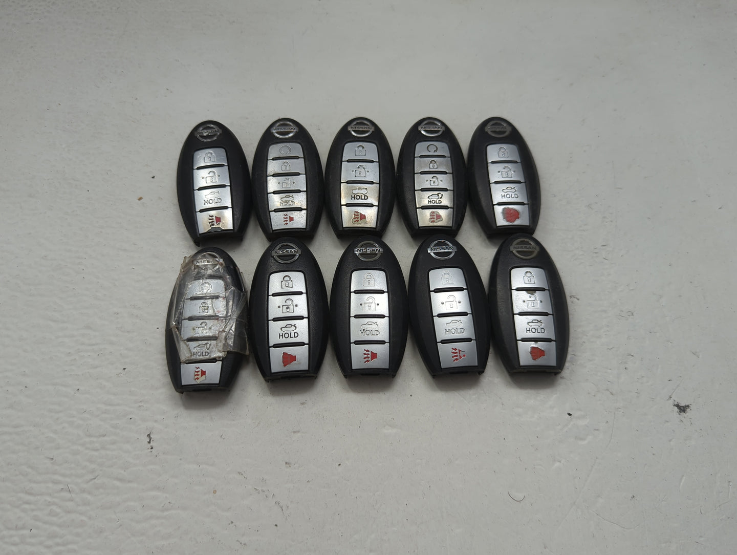 Lot of 10 Nissan Keyless Entry Remote Fob MIXED FCC IDS MIXED PART 1475447 - Oemusedautoparts1.com