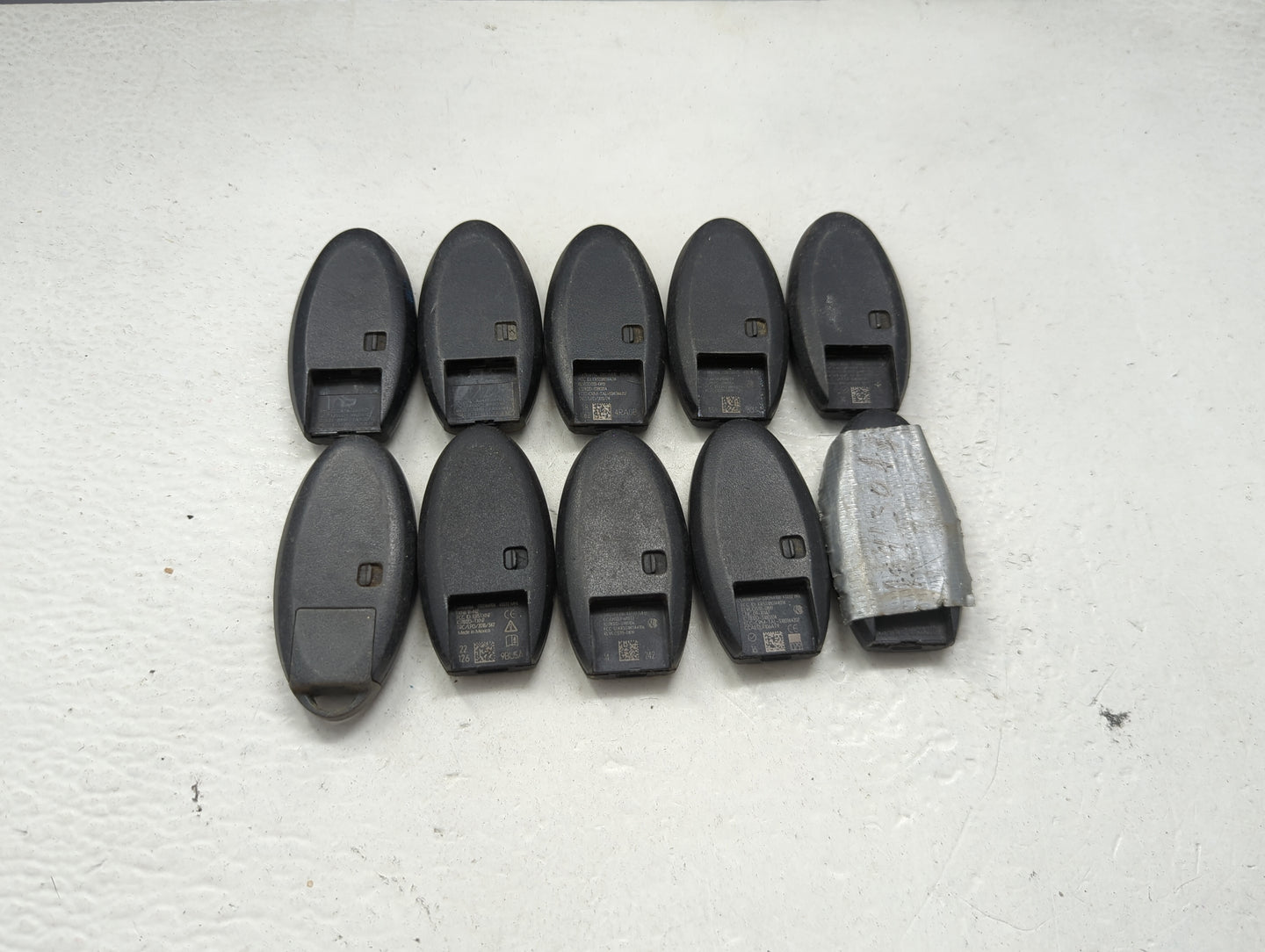 Lot of 10 Nissan Keyless Entry Remote Fob MIXED FCC IDS MIXED PART 1475508 - Oemusedautoparts1.com