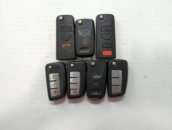 compare product Lot of 7 Nissan Keyless Entry Remote Fob CWTWB1G767