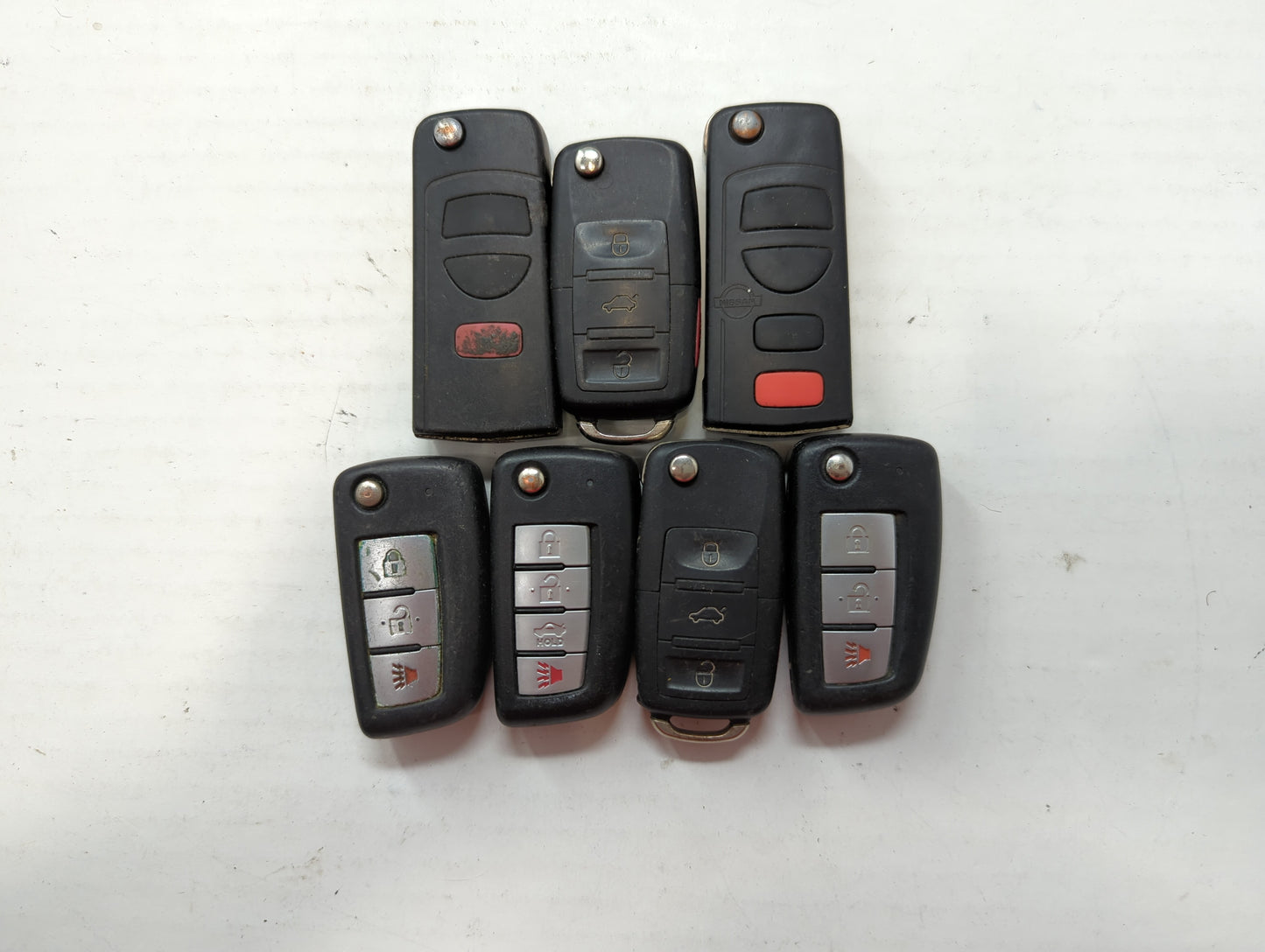 Lot of 7 Nissan Keyless Entry Remote Fob CWTWB1G767 - Oemusedautoparts1.com