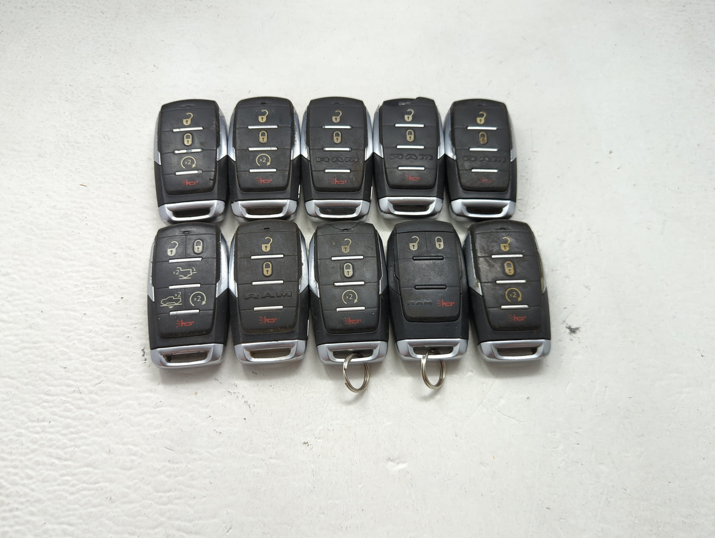 Lot of 10 Ram Keyless Entry Remote Fob MIXED FCC IDS MIXED PART NUMBERS 1475698 - Oemusedautoparts1.com