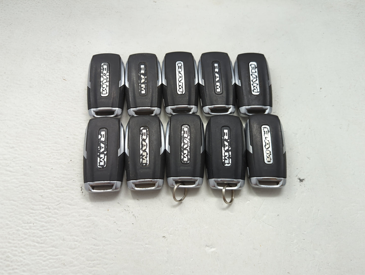 Lot of 10 Ram Keyless Entry Remote Fob MIXED FCC IDS MIXED PART NUMBERS 1475698 - Oemusedautoparts1.com