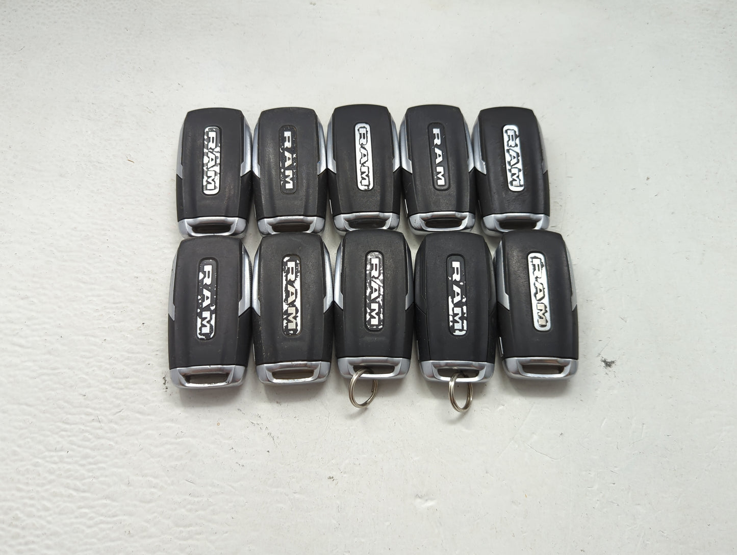 Lot of 10 Ram Keyless Entry Remote Fob MIXED FCC IDS MIXED PART NUMBERS 1475698 - Oemusedautoparts1.com