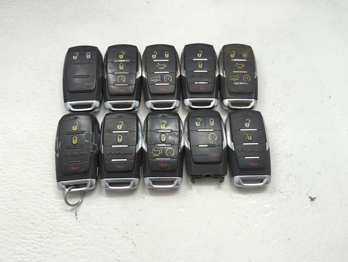 Lot of 10 Ram Keyless Entry Remote Fob MIXED FCC IDS MIXED PART NUMBERS 1475699 - Oemusedautoparts1.com