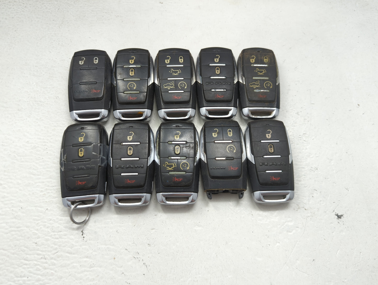 Lot of 10 Ram Keyless Entry Remote Fob MIXED FCC IDS MIXED PART NUMBERS 1475699 - Oemusedautoparts1.com