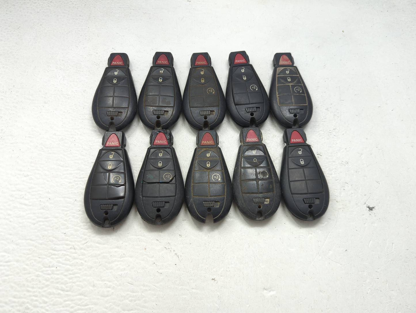 Lot of 10 Ram Keyless Entry Remote Fob MIXED FCC IDS MIXED PART NUMBERS 1475710 - Oemusedautoparts1.com