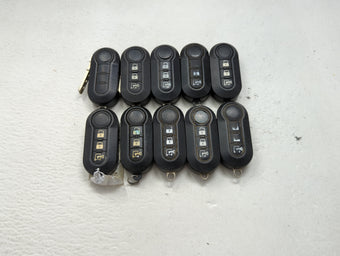 compare product Lot of 10 Ram Keyless Entry Remote Fob MIXED FCC IDS 1475758