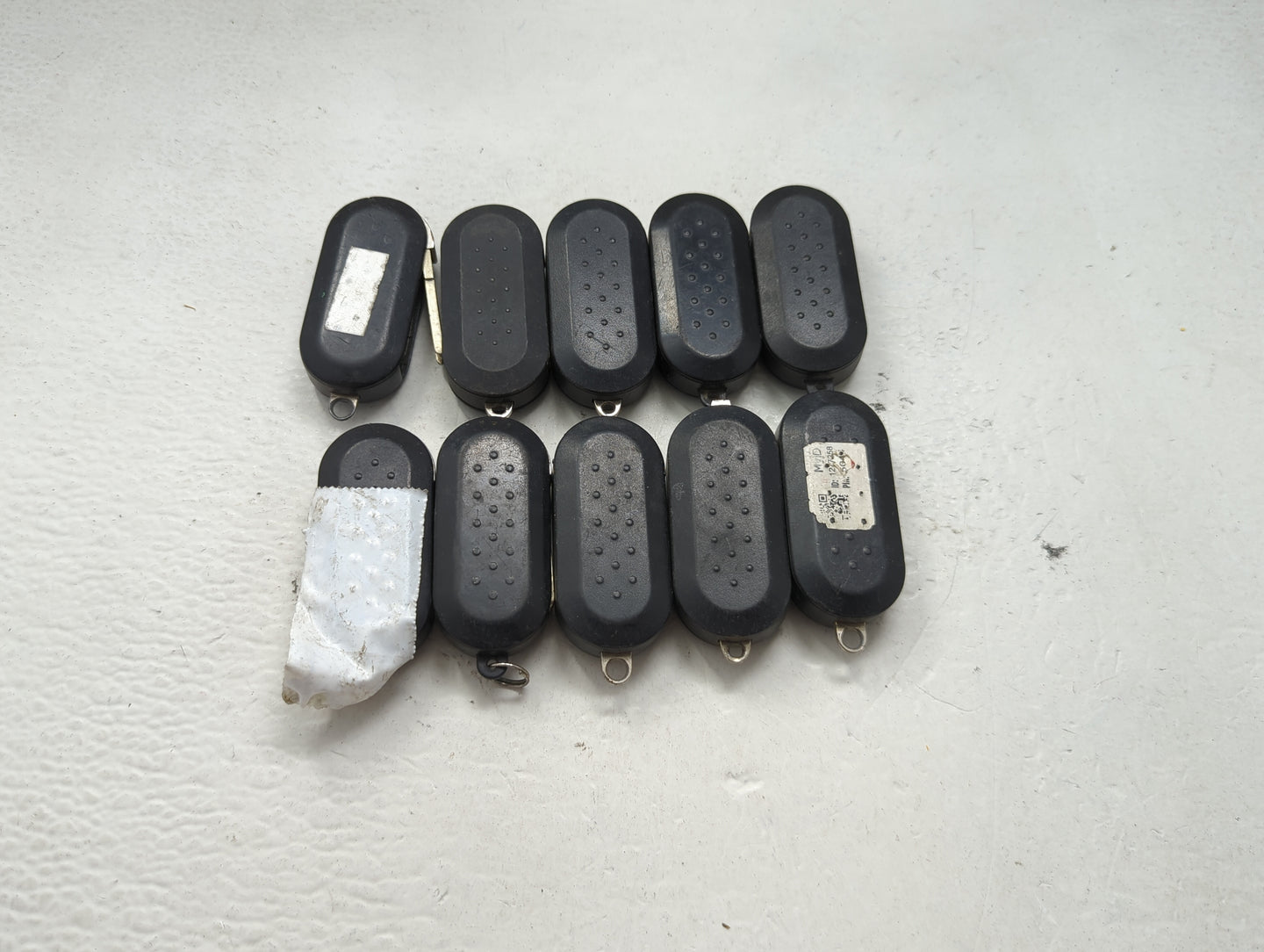 Lot of 10 Ram Keyless Entry Remote Fob MIXED FCC IDS 1475758 - Oemusedautoparts1.com