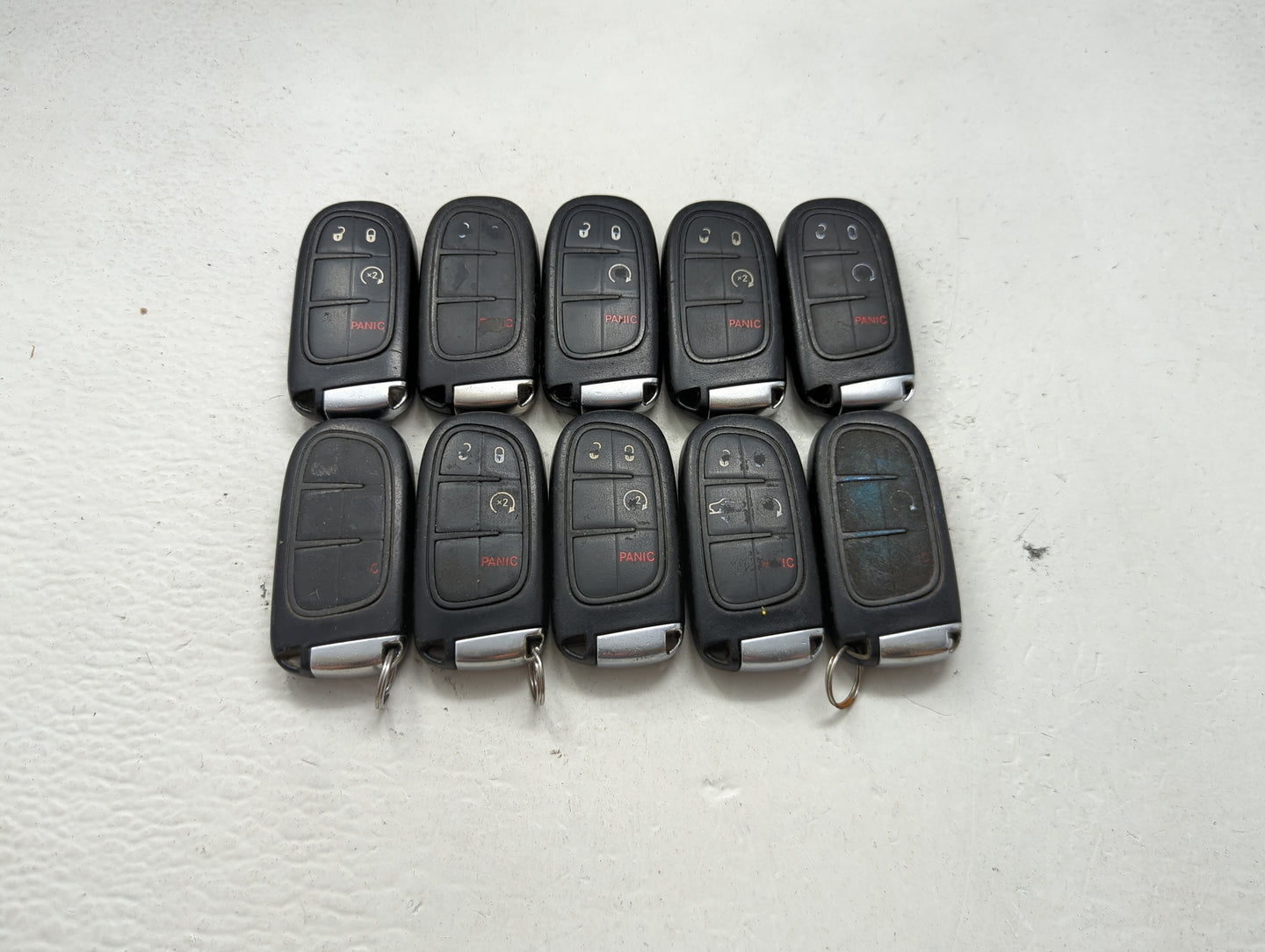 Lot of 10 Ram Keyless Entry Remote Fob MIXED FCC IDS MIXED PART NUMBERS 1475771 - Oemusedautoparts1.com