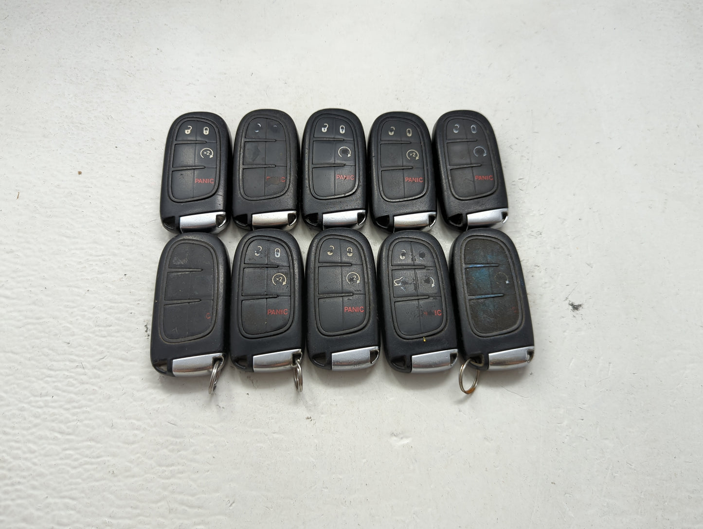 Lot of 10 Ram Keyless Entry Remote Fob MIXED FCC IDS MIXED PART NUMBERS 1475771 - Oemusedautoparts1.com