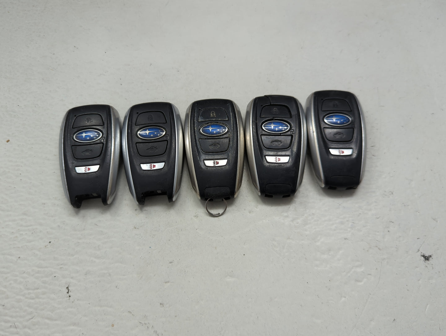Lot of 5 Subaru Keyless Entry Remote Fob MIXED FCC IDS 1474117 - Oemusedautoparts1.com