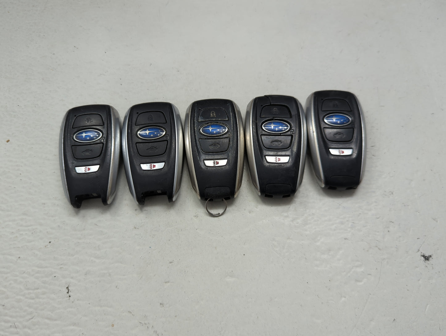 Lot of 5 Subaru Keyless Entry Remote Fob MIXED FCC IDS 1474117 - Oemusedautoparts1.com