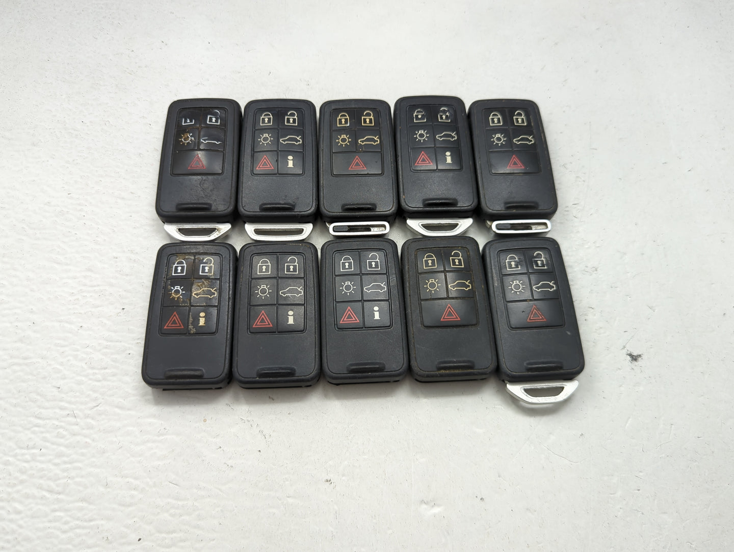 Lot of 10 Volvo Keyless Entry Remote Fob MIXED FCC IDS MIXED PART 1474176 - Oemusedautoparts1.com