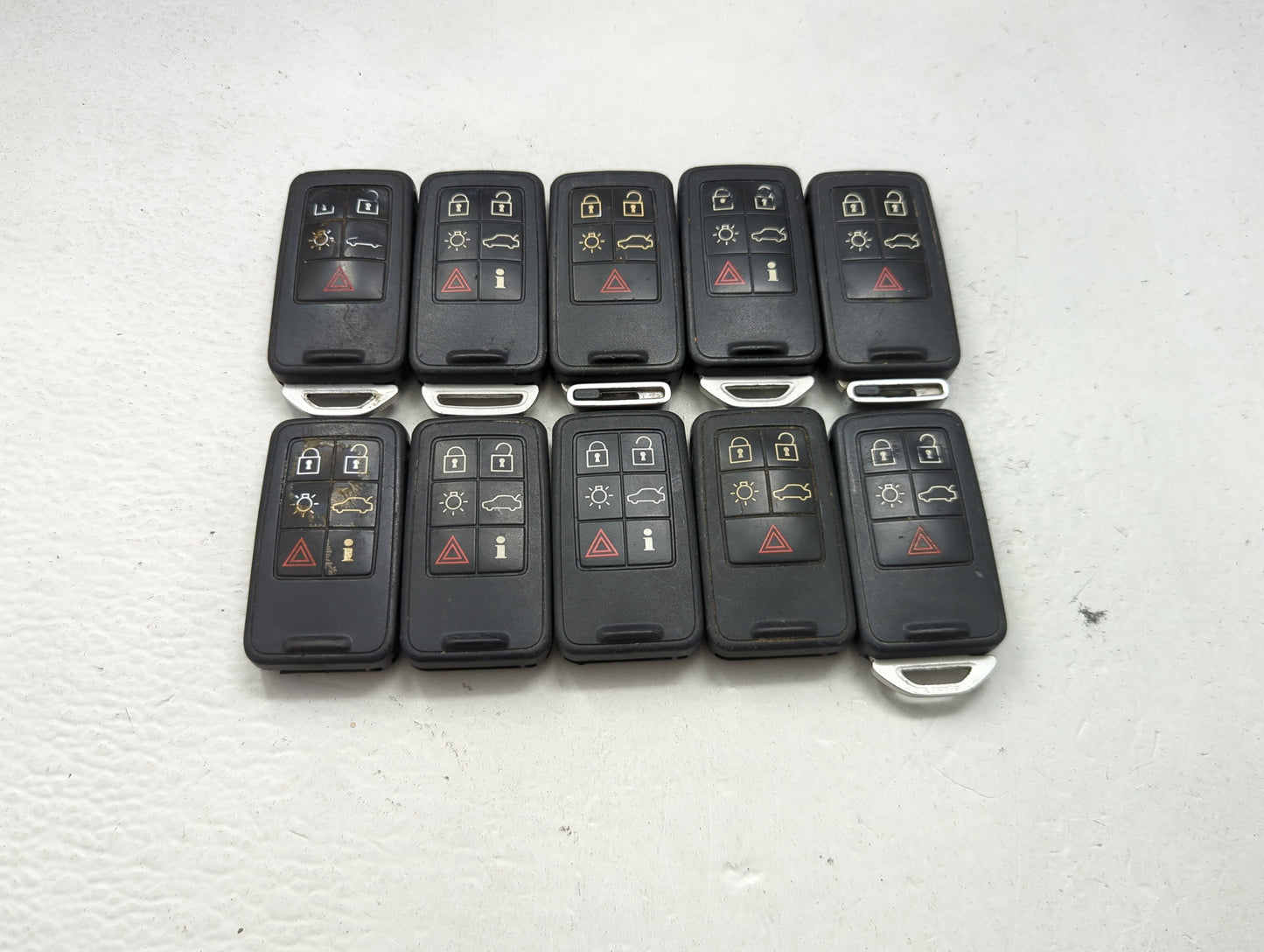 Lot of 10 Volvo Keyless Entry Remote Fob MIXED FCC IDS MIXED PART 1474176 - Oemusedautoparts1.com