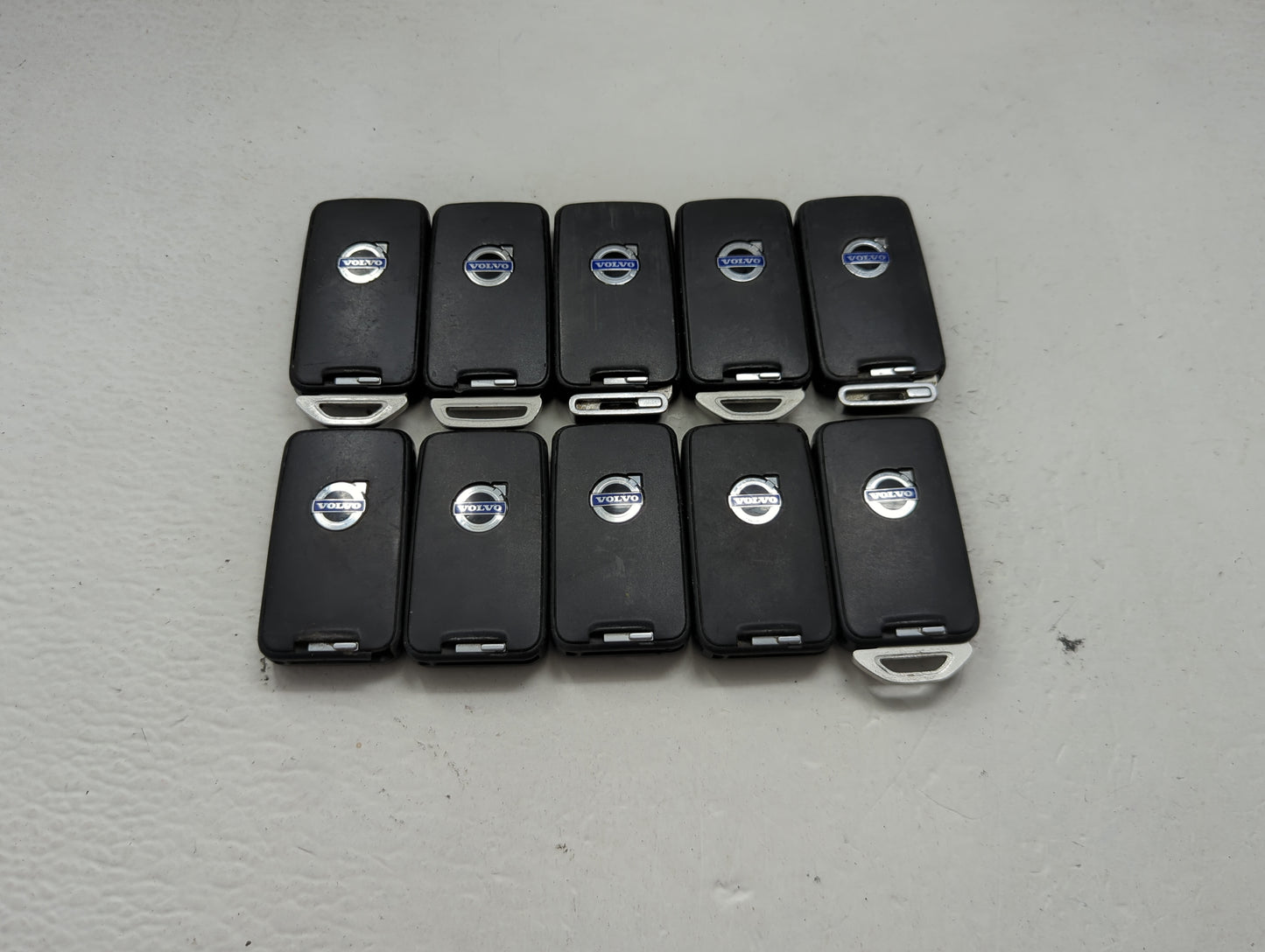 Lot of 10 Volvo Keyless Entry Remote Fob MIXED FCC IDS MIXED PART 1474176 - Oemusedautoparts1.com