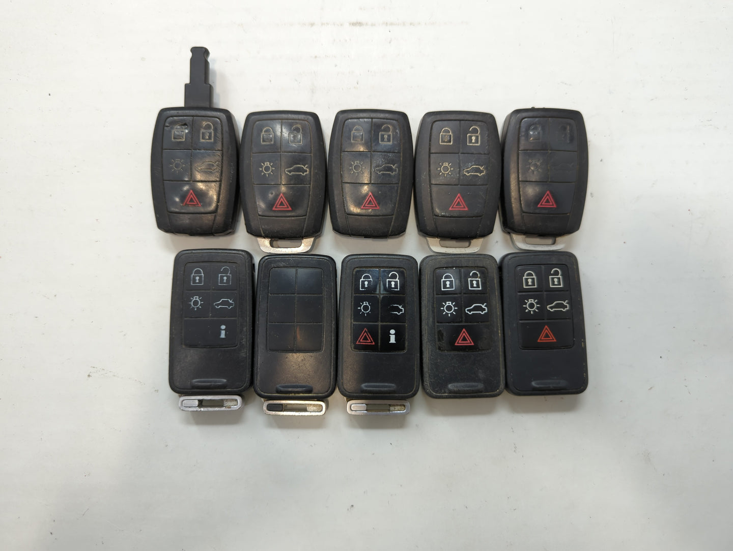 Lot of 10 Volvo Keyless Entry Remote Fob MIXED FCC IDS MIXED PART NUMBERS - Oemusedautoparts1.com