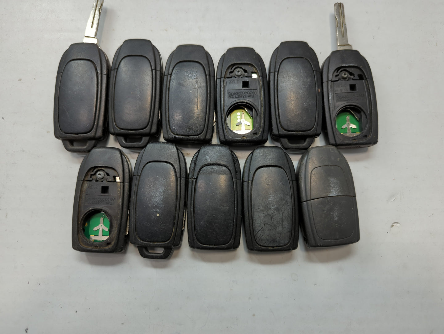 Lot of 11 Volvo Keyless Entry Remote Fob MIXED FCC IDS MIXED PART NUMBERS - Oemusedautoparts1.com