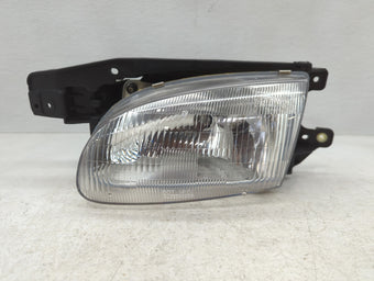compare product 1998-1999 Hyundai Accent Driver Left Oem Head Light Headlight Lamp