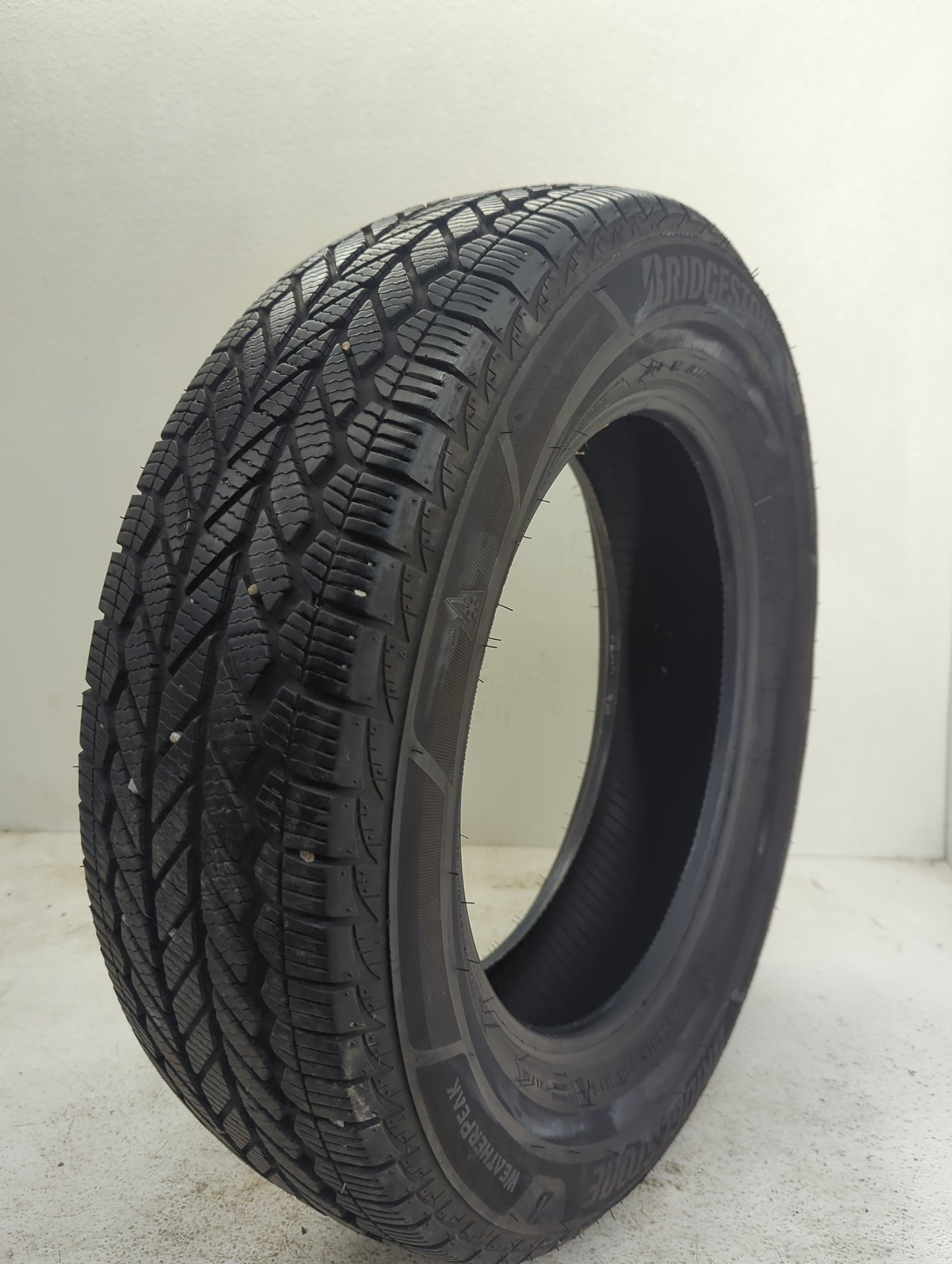 Used Tire 205/65R16 BRIDGESTONE WEATHERPEAK 95H - Tread Depth 6.5/32 - Oemusedautoparts1.com