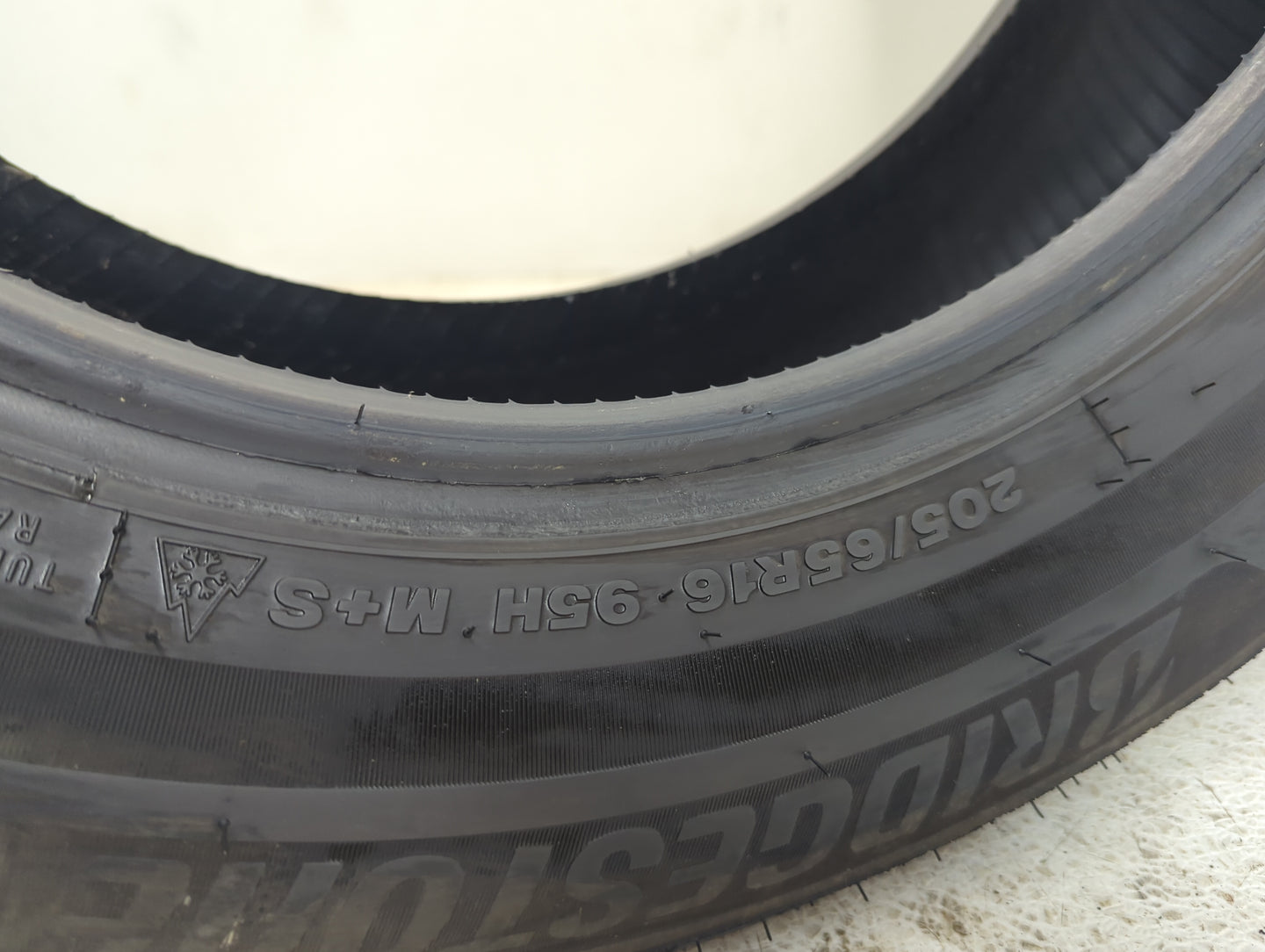 Used Tire 205/65R16 BRIDGESTONE WEATHERPEAK 95H - Tread Depth 6.5/32 - Oemusedautoparts1.com