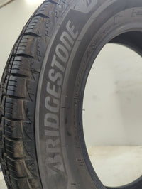 Used Tire 225/65R17 BRIDGESTONE WEATHERPEAK 102H - Tread Depth 10/32 - Oemusedautoparts1.com