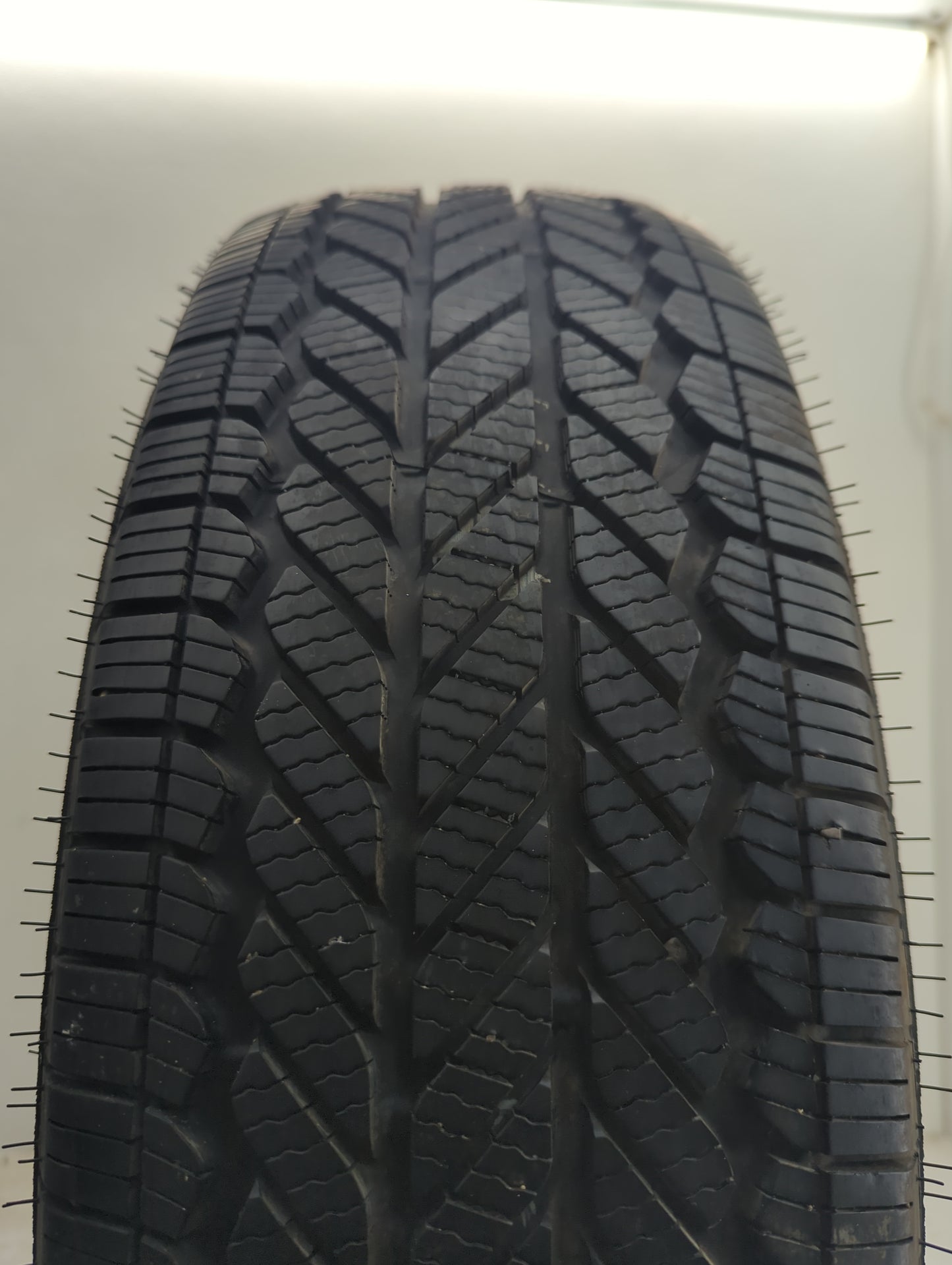 Used Tire 225/65R17 BRIDGESTONE WEATHERPEAK 102H - Tread Depth 10/32 - Oemusedautoparts1.com