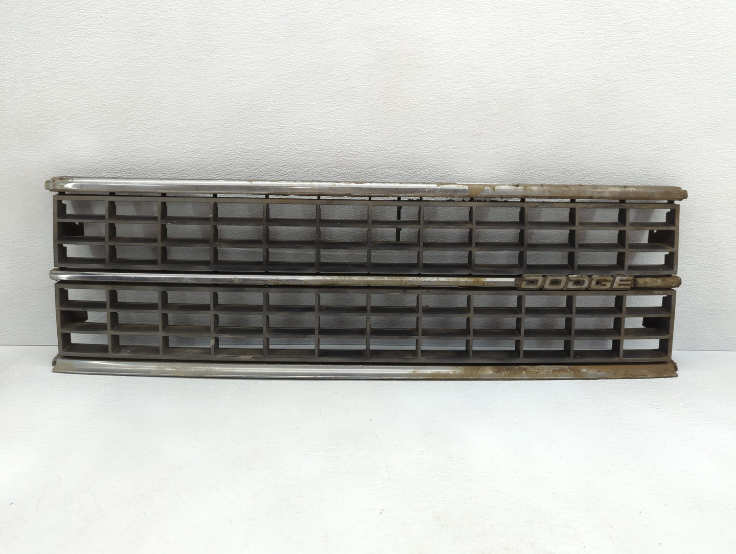 1988 Dodge Caravan Front Grille Bumper Not Included - Oemusedautoparts1.com