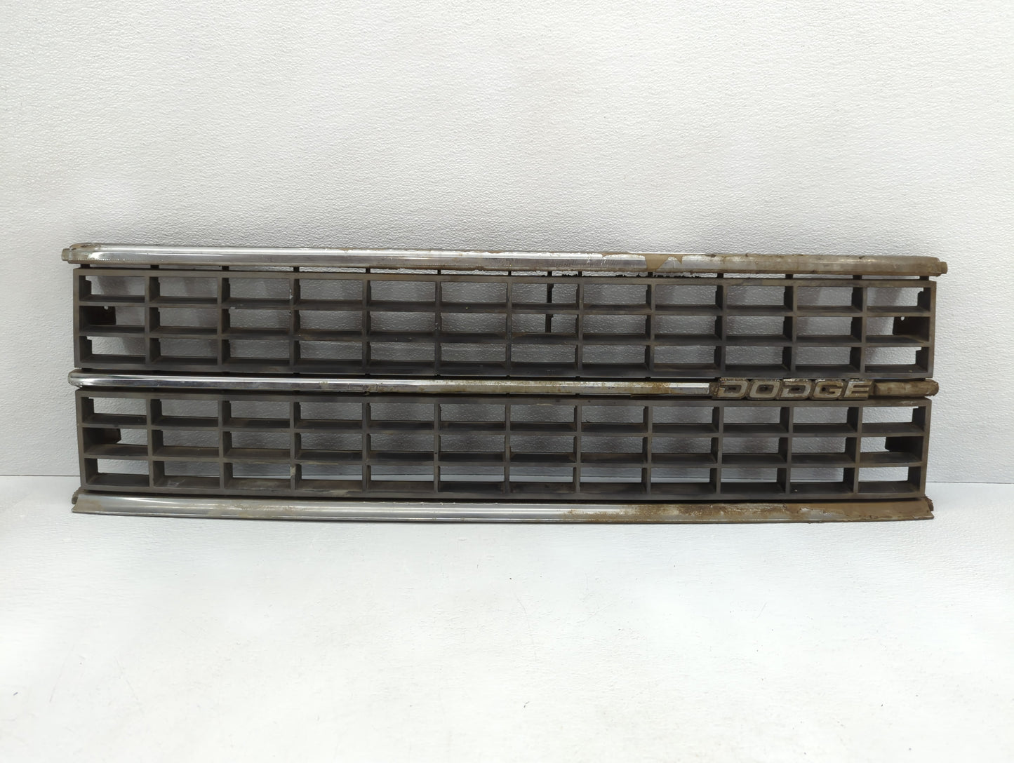 1988 Dodge Caravan Front Grille Bumper Not Included - Oemusedautoparts1.com