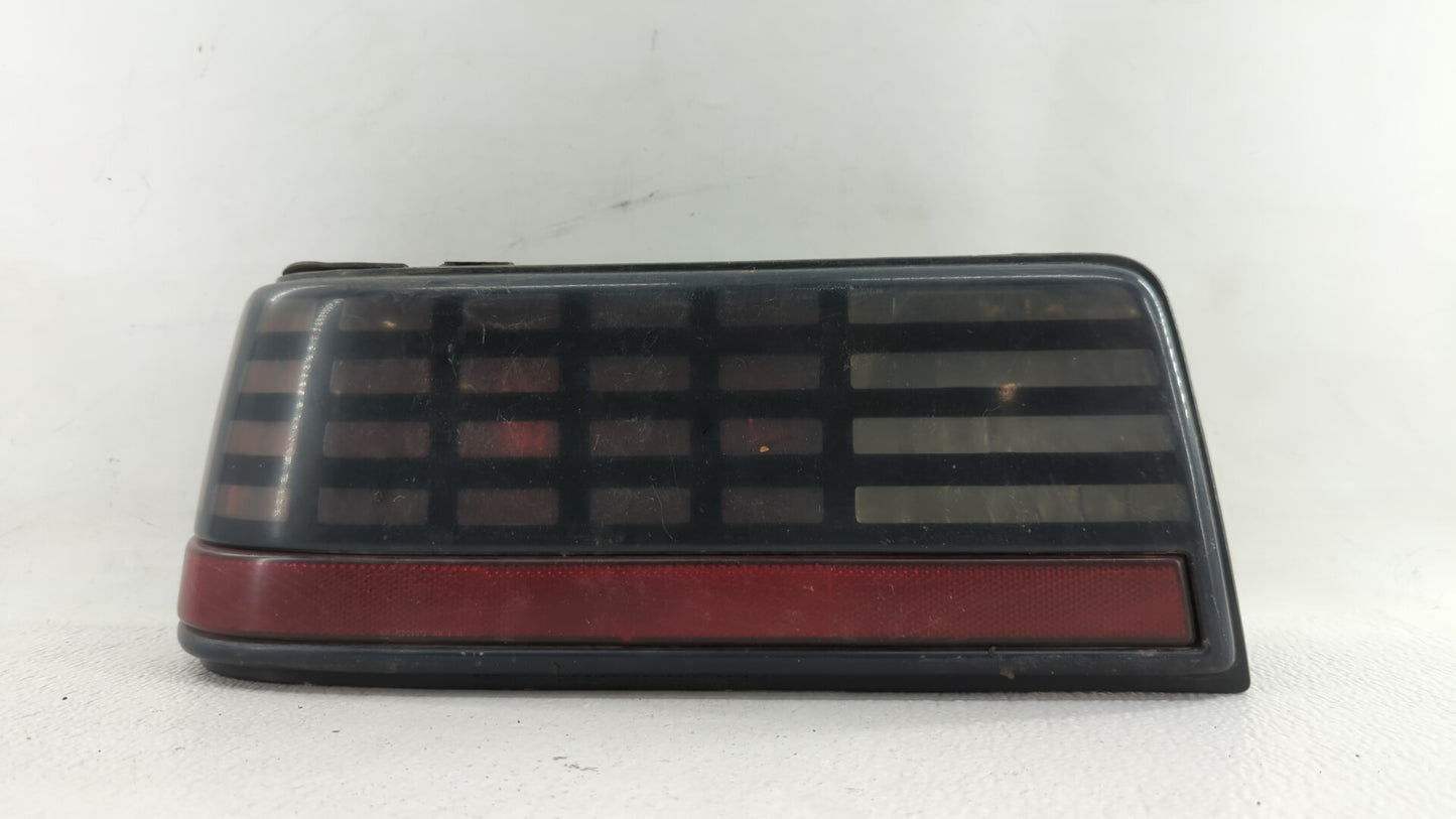 1989 Pontiac Grand Am Tail Light Assembly Driver Left OEM P/N:16509865 Fits OEM Used Auto Parts - Oemusedautoparts1.com