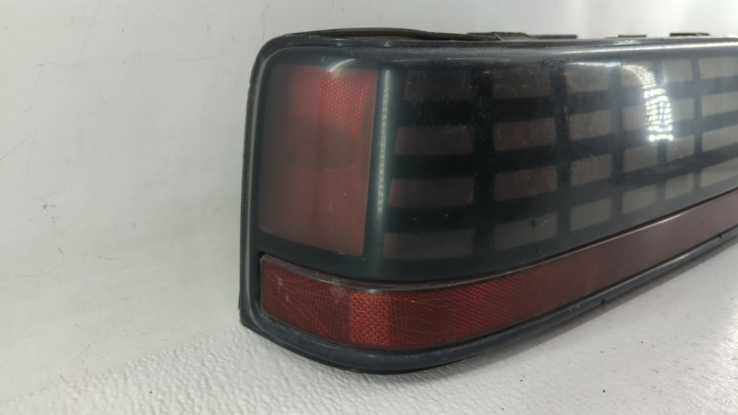 1989 Pontiac Grand Am Tail Light Assembly Driver Left OEM P/N:16509865 Fits OEM Used Auto Parts - Oemusedautoparts1.com