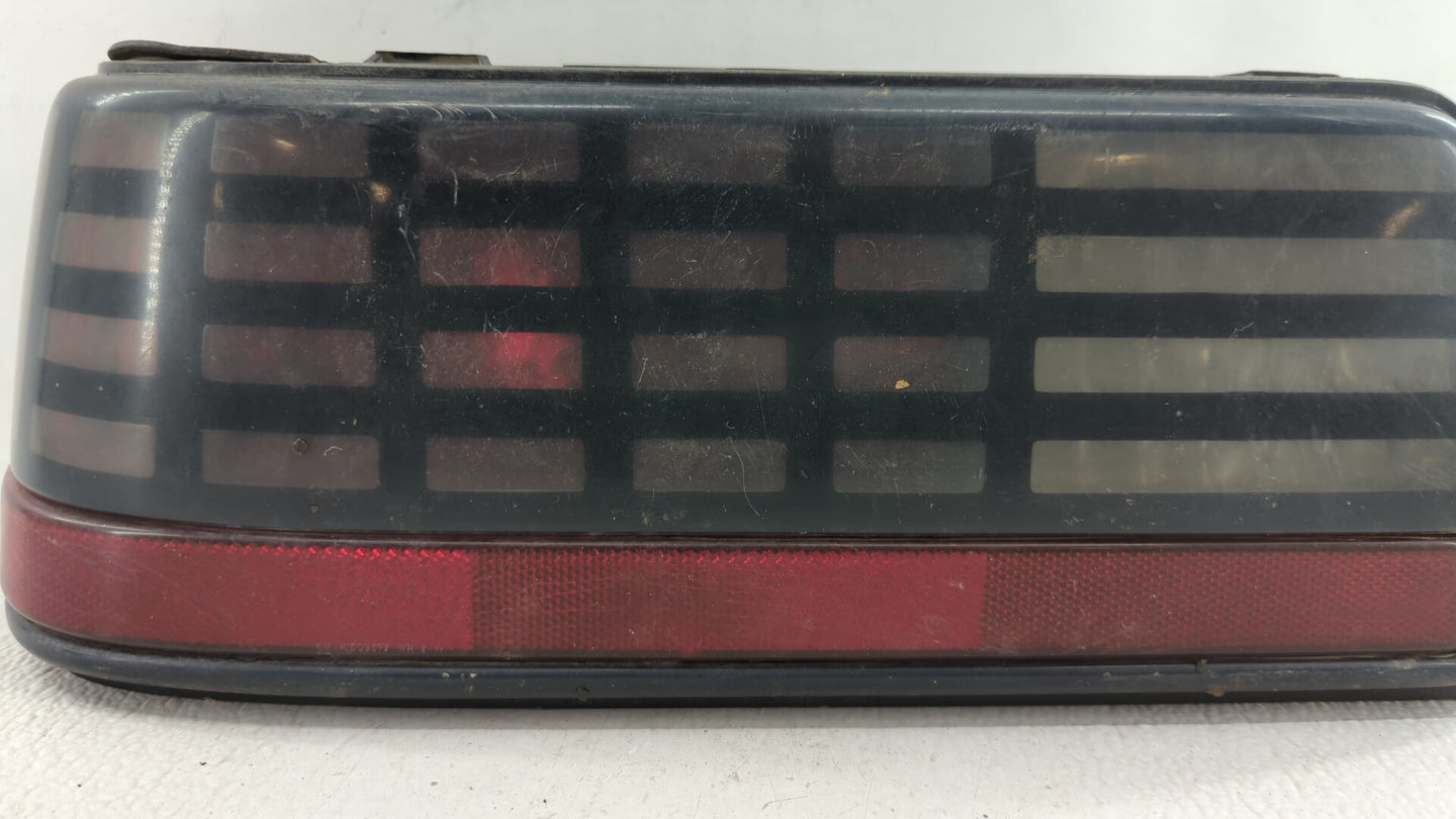 1989 Pontiac Grand Am Tail Light Assembly Driver Left OEM P/N:16509865 Fits OEM Used Auto Parts - Oemusedautoparts1.com