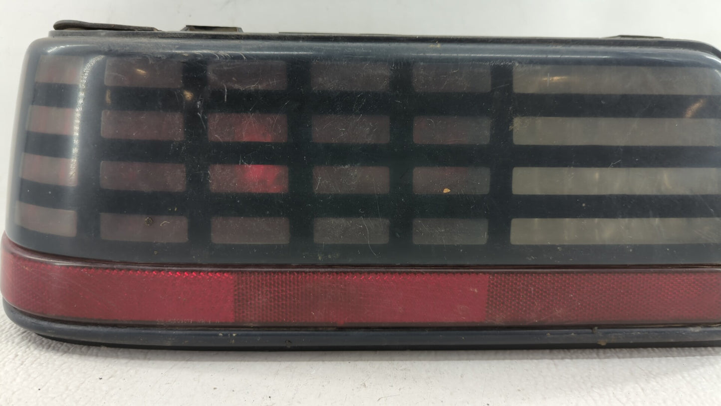 1989 Pontiac Grand Am Tail Light Assembly Driver Left OEM P/N:16509865 Fits OEM Used Auto Parts - Oemusedautoparts1.com