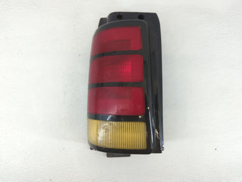 compare product 1991 Dodge Caravan Tail Light Assembly Driver Left OEM P/N:5054B 115054B, 11-5054B Fits OEM Used Auto Parts