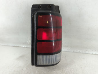 compare product 1992 Dodge Grand Caravan Tail Light Assembly Driver Left OEM P/N:1911011-13 55062, 4399724 Fits OEM Used Auto Parts