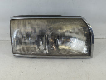 compare product 1992 Oldsmobile Delta 88 Driver Left Oem Head Light Headlight Lamp