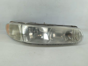 compare product Chrysler New Yorker Driver Left Oem Head Light Headlight Lamp 534431