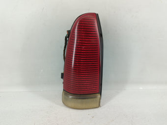 compare product 1993 Chrysler New Yorker Tail Light Assembly Driver Left OEM P/N:5262063 Fits OEM Used Auto Parts