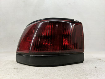 compare product 1993 Mercury Tracer Tail Light Assembly Driver Left OEM P/N:043-1326 Fits OEM Used Auto Parts